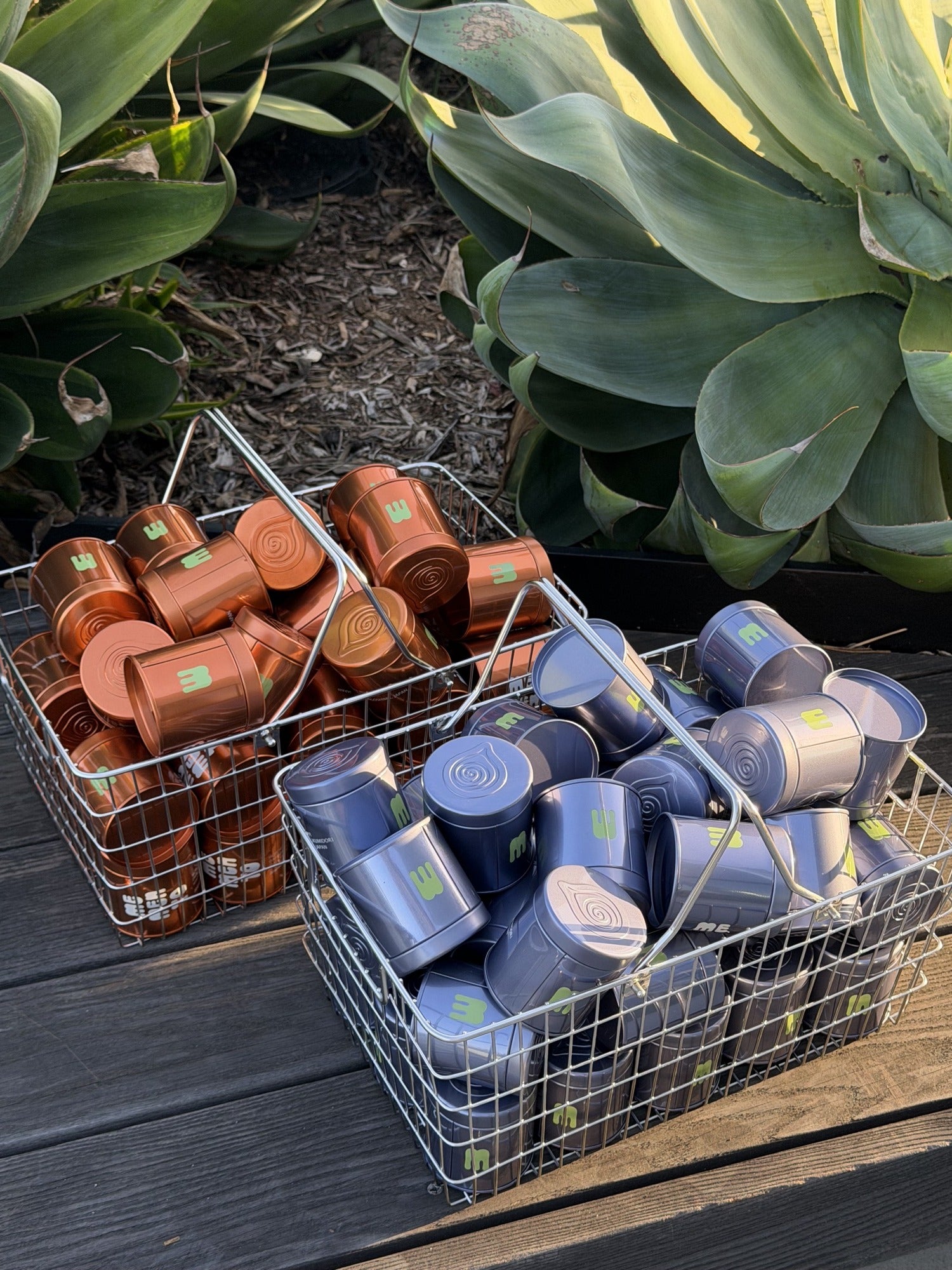Baskets of Memento matcha and hojicha tins